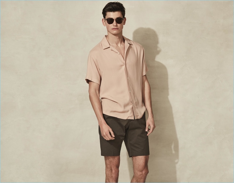Bringing color into its lineup, Reiss makes a dusky proposal with its pink Cuban collar shirt. The subtle statement pairs well with the brand's tailored shorts.