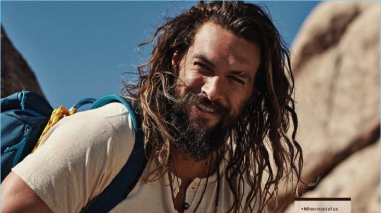 All smiles, Jason Momoa rocks a Velva Sheen henley with J Brand pants, and Timberland boots.