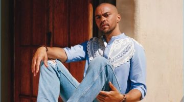 Jesse Williams Sports Summer Looks for GQ Style, Talks Activism Making quite a statement, Jesse Williams wears a Burberry lace adorned shirt with Gucci jeans, a David Yurman bracelet and Omega watch.
