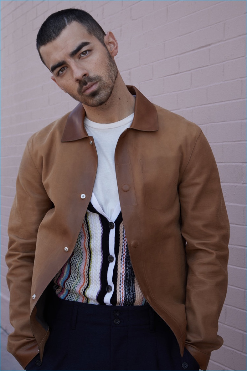 DNCE frontman Joe Jonas wears an Ermenegildo Zegna Couture leather jacket with a Missoni knit cardigan and Off-White tee.