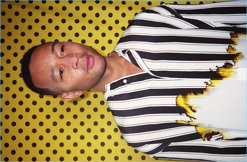 Singer John Legend wears a striped shirt by Haider Ackermann.