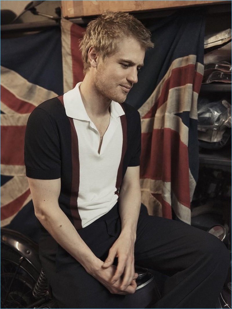 Johnny Flynn wears a Dsquared2 polo with McQ by Alexander McQueen trousers.