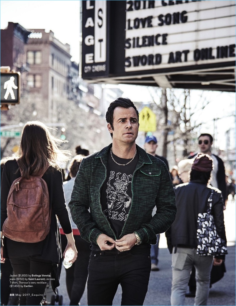 Heading out, Justin Theroux wears a Bottega Veneta jacket with Saint Laurent jeans, a Jerzees t-shirt, and a Cartier necklace.