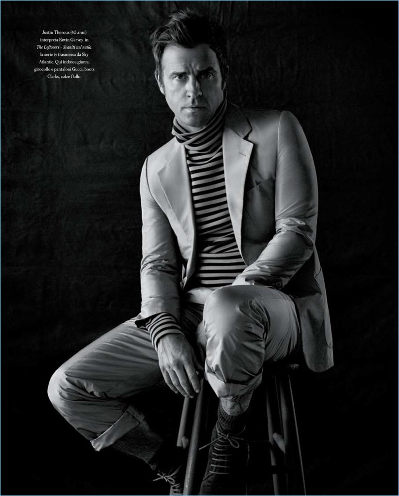 Sitting for a portrait, Justin Theroux wears a a chic look by Gucci with Clarks shoes.