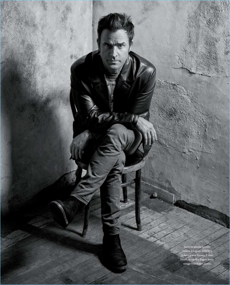 Front and center, Justin Theroux wears a Versace leather jacket with a Hanes t-shirt, Roy Rogers jeans, and vintage Yves Saint Laurent boots.