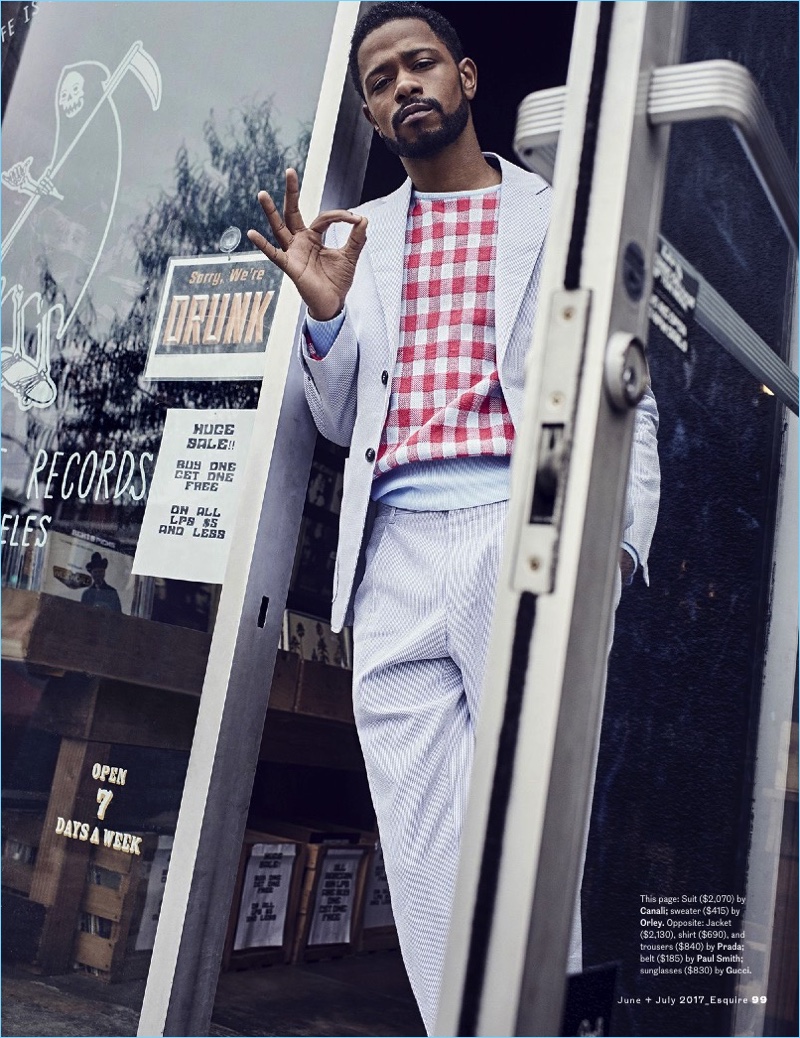 Stepping out, Lakeith Stanfield sports a Canali suit with an Orley check sweater.