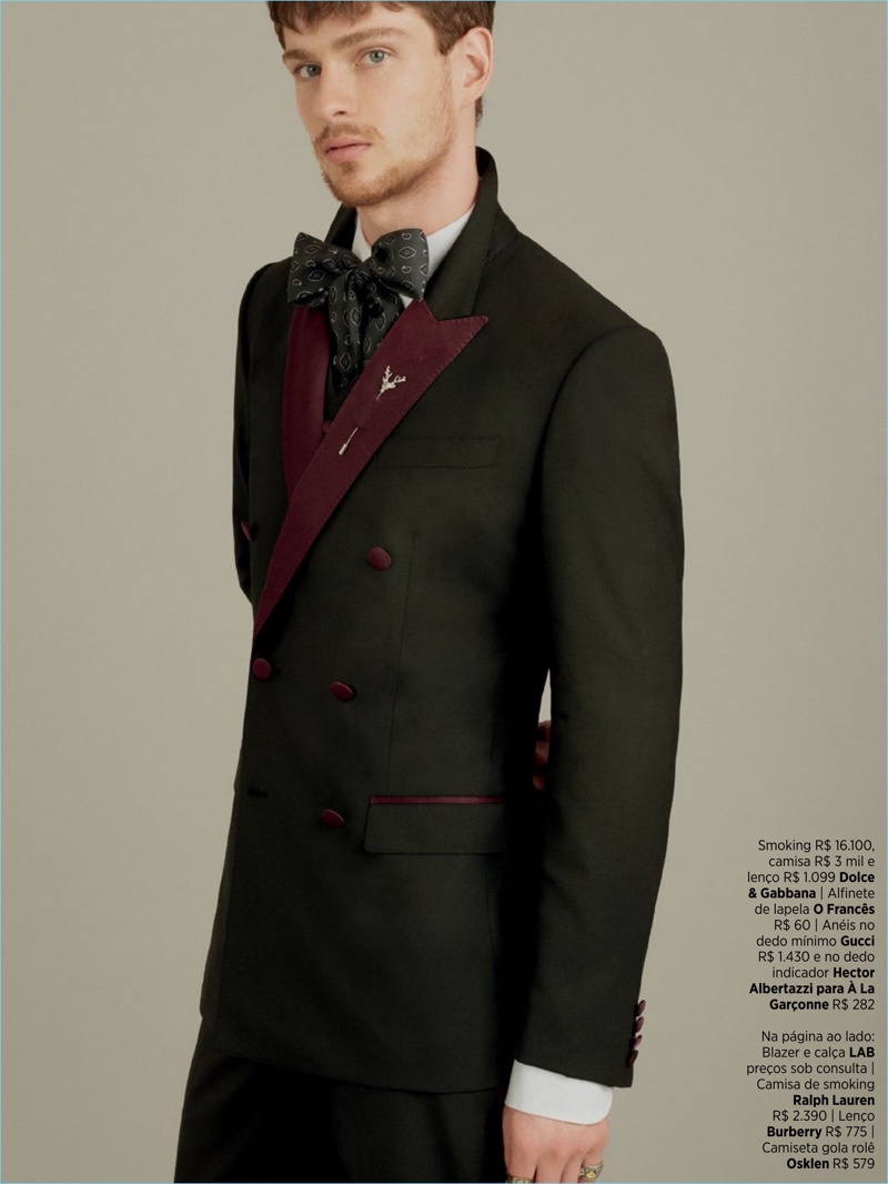 Lucas Mascarini wears a shirt, smoking jacket, and trousers by Dolce & Gabbana.