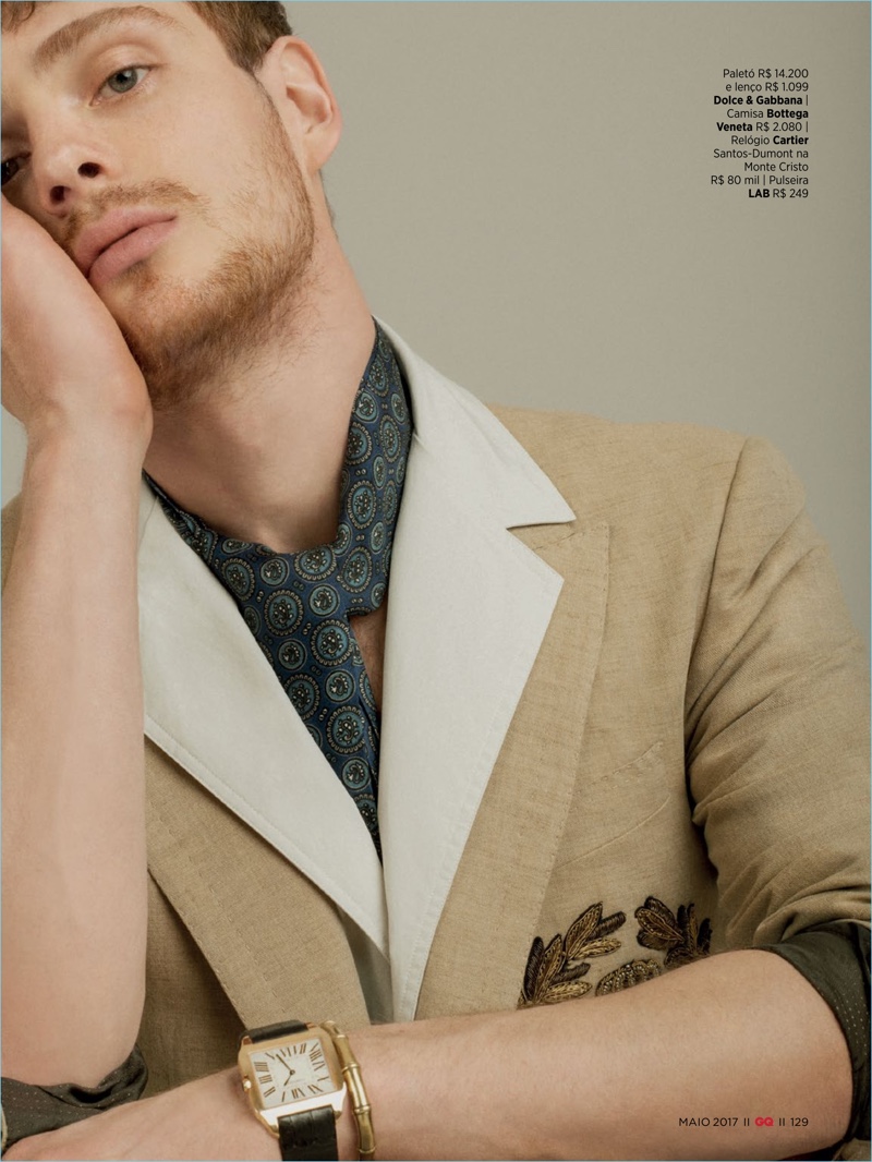 Stealing a quiet moment, Lucas Mascarini wears a Bottega Veneta shirt and Dolce & Gabbana jacket with a Cartier watch.