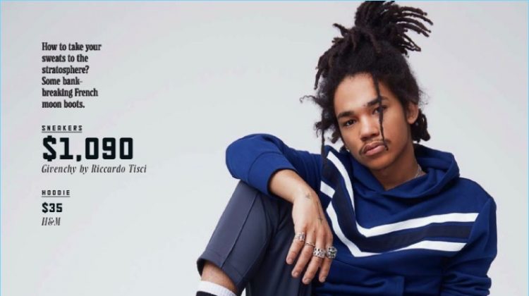 Model Luka Sabbat sports a H&M hoodie with H&M track pants, Givenchy sneakers, and Vetements x Reebok socks.