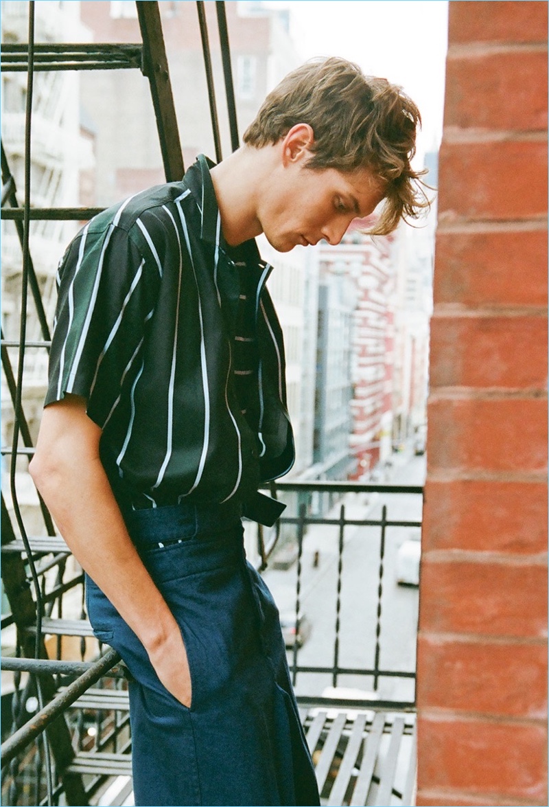 Felix Gesnouin wears a striped AMI shirt with Marni cut-out belt cropped denim trousers $568.