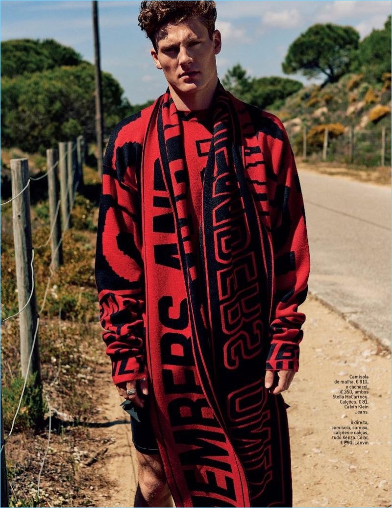 Making a bold statement in red and black, Mikkel Jensen wears Stella McCartney with Calvin Klein Jeans shorts.