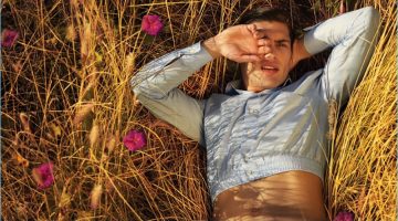 Sun-kissed, Miroslav Cech sports a cropped jacket by Balenciaga.