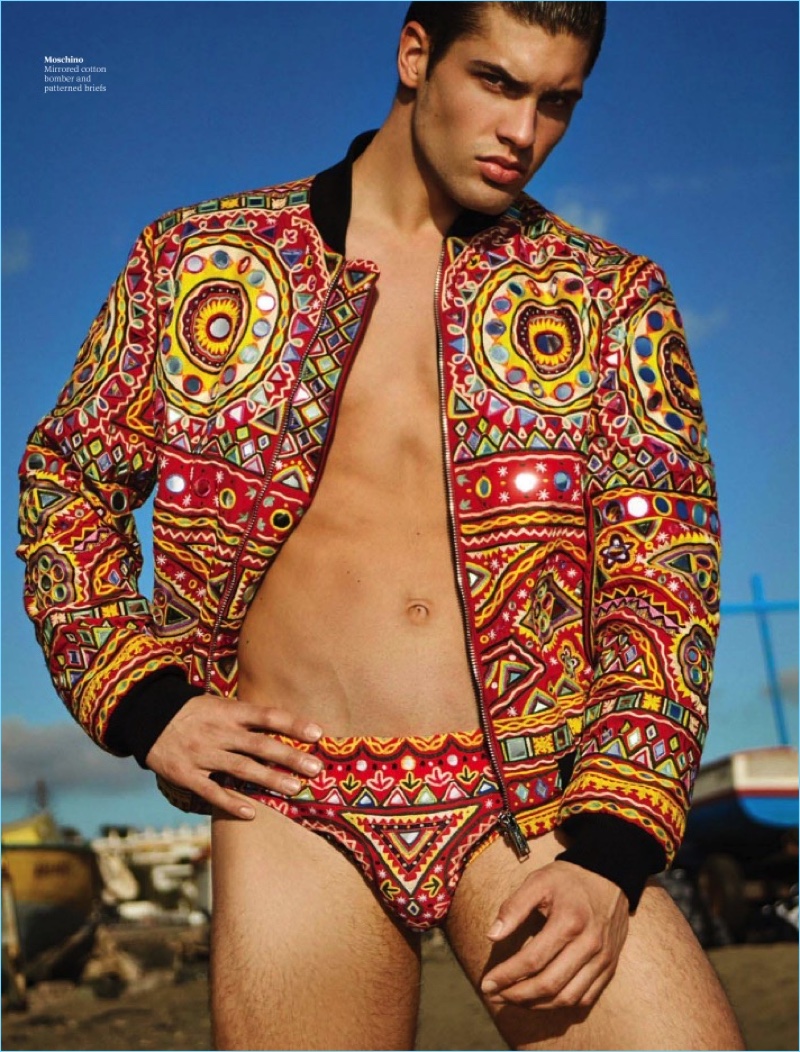Making a printed statement, Miroslav Cech wears a printed bomber jacket and underwear from Moschino.