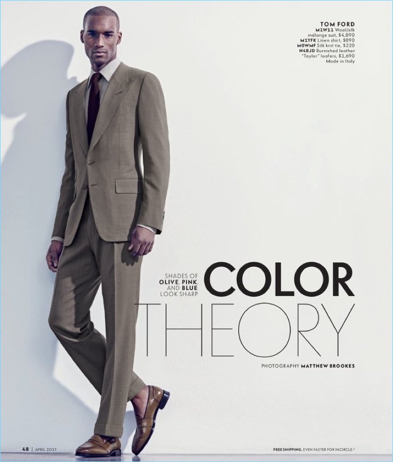 A sharp vision, Corey Baptiste wears a tailored suit by Tom Ford.