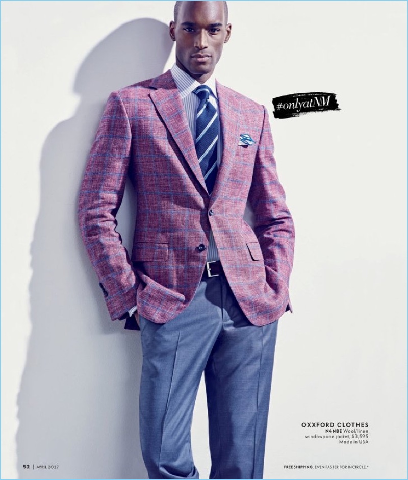 Bringing color into his wardrobe, Corey Baptiste wears Oxxford Clothes.
