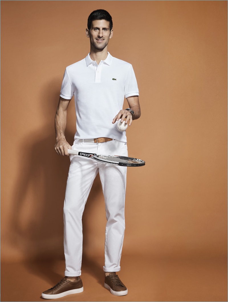 Wearing all white, Novak Djokovic fronts Lacoste's advertising campaign.