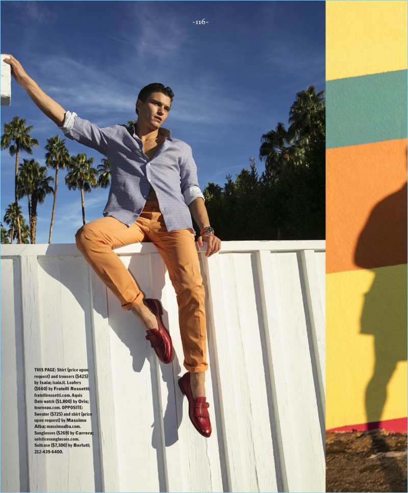 British model Oliver Cheshire dons an ISAIA shirt and trousers with Fratelli Rossetti loafers.