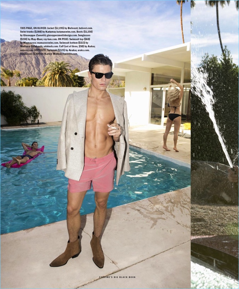 Relaxing poolside, Oliver Cheshire wears a Belvest jacket with Katama swim shorts, Ray-Ban sunglasses, and Giuseppe Zanotti boots.