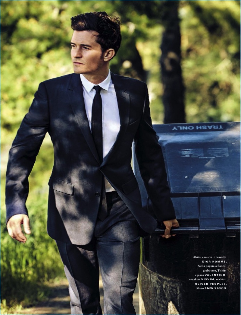 Suiting up, Orlando Bloom wears a sharp look from Dior Homme.