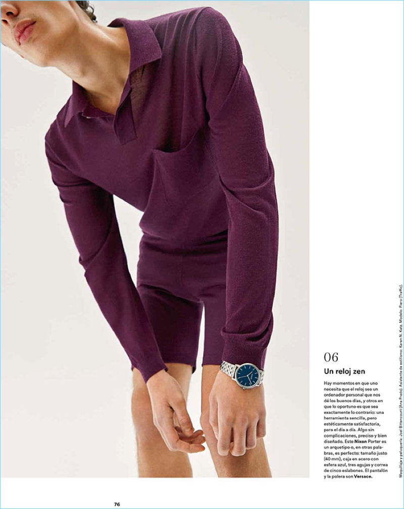 Model Piero Mendez dons a purple Versace look with a Nixon watch.