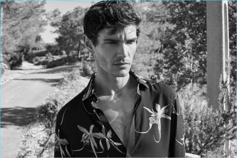 Escaping to Ibiza, Julien Sabaud wears a Reiss floral print shirt $160.