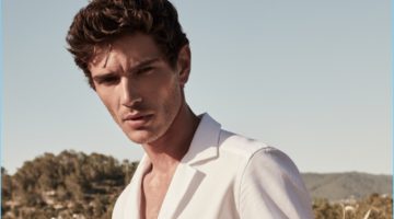 Escape the Ordinary: Reiss Travels to Ibiza with High Summer Style French model Julien Sabaud wears a Reiss white Cuban-collar shirt $145 with slim-fit chinos $180.