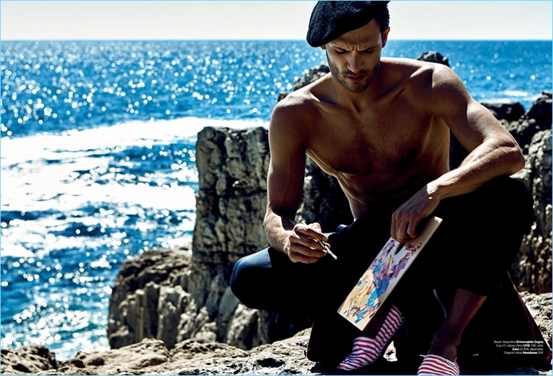 Painting at the beach, Ricardo Oliveira dons COS chinos with Havaianas shoes.