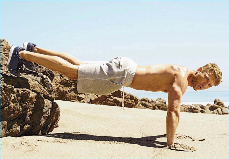 Starring in a Men's Fitness photo shoot, Ryan Phillippe does a decline pushup.