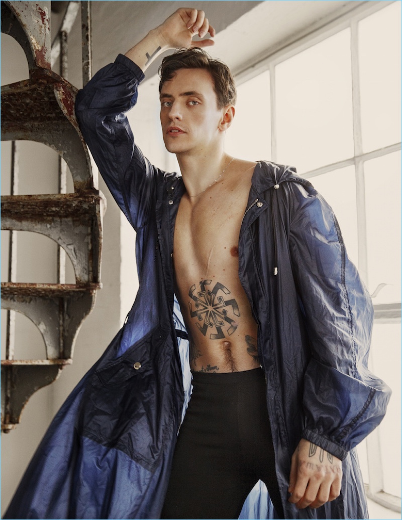 Sergei Polunin wears a jacket and trousers by Versace.