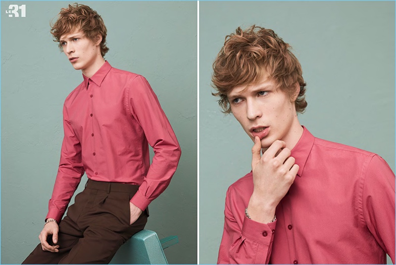 Model Sven de Vries sports a dusky pink semi-tailored fit shirt with brown retro pants from LE 31.