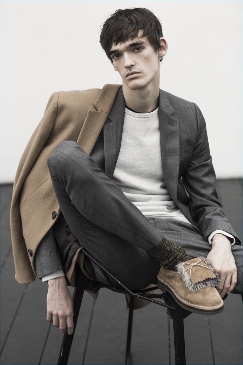 Florentin Glemarec wears Solovière's Manolette Kilt suede loafers.