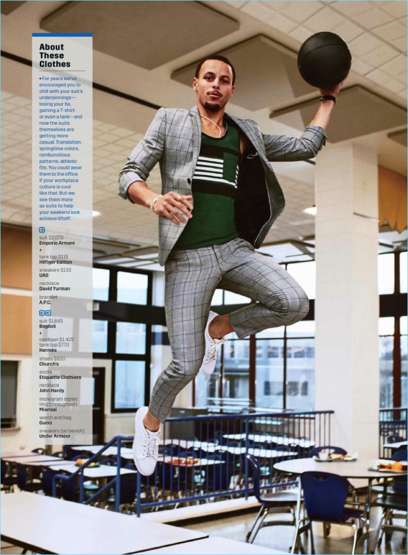 Reaching great heights, Steph Curry wears an Emporio Armani check suit with a Hilfiger Edition tank, and UAS sneakers.