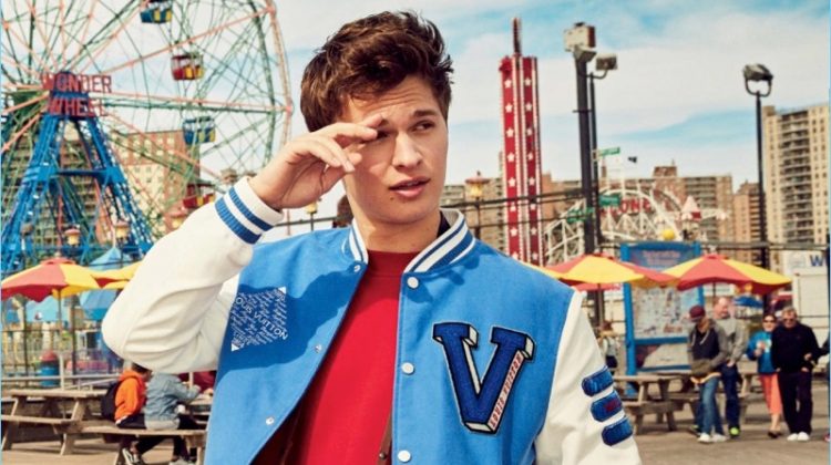 Actor Ansel Elgort wears an AMI sweatshirt with jeans and a jacket by Louis Vuitton.