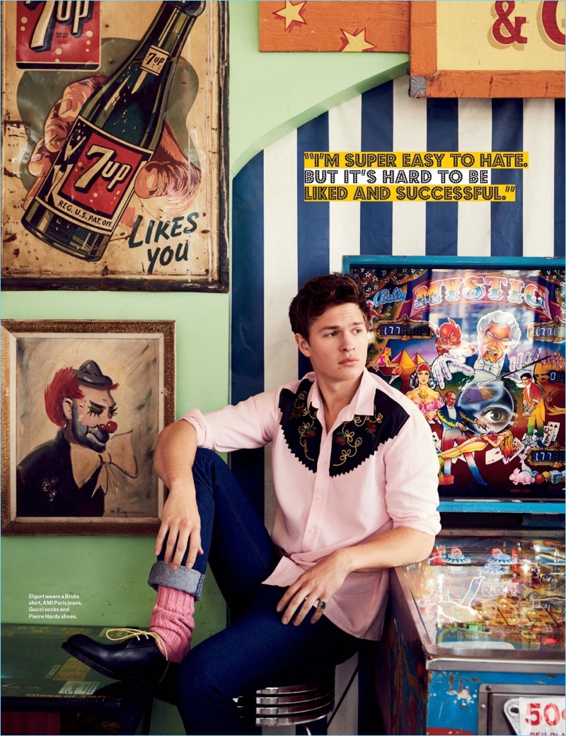 Connecting with Billboard, Ansel Elgort wears a Bruta shirt with AMI jeans, Gucci socks, and Pierre Hardy shoes.