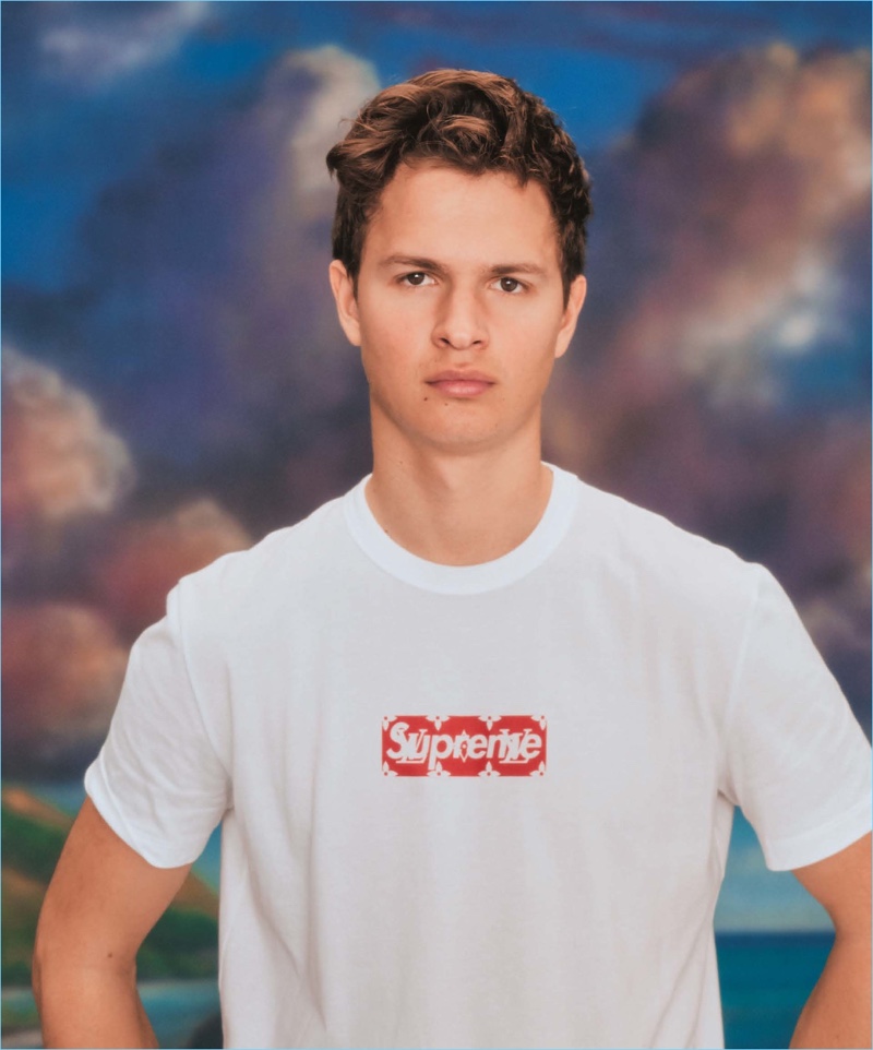 Actor Ansel Elgort sports a Louis Vuitton x Supreme t-shirt.