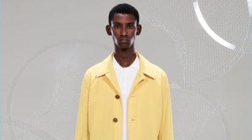 Sophisticated Traveler: Canali Presents Spring '18 Collection Model Myles Dominique sports a standout yellow coat from Canali's spring-summer 2018 collection.