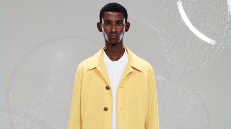 Model Myles Dominique sports a standout yellow coat from Canali's spring-summer 2018 collection.