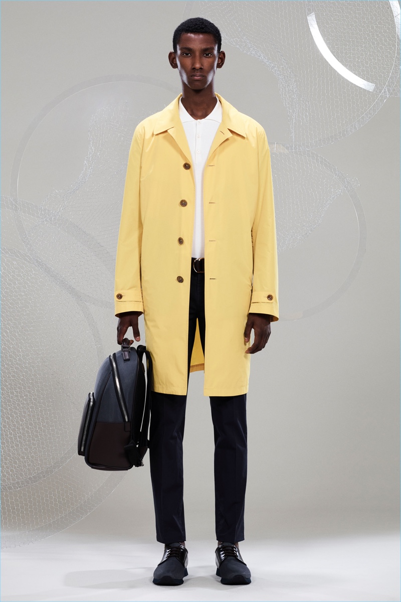 Model Myles Dominique sports a standout yellow coat from Canali's spring-summer 2018 collection.