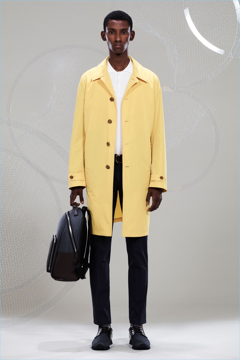 Model Myles Dominique sports a standout yellow coat from Canali's spring-summer 2018 collection. » Sophisticated Traveler: Canali Presents Spring '18 Collection Model Myles Dominique sports a standout yellow coat from Canali's spring-summer 2018 collection.