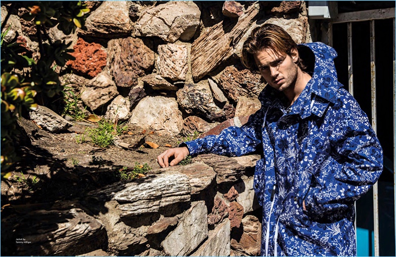 Venturing outdoors, Chad James Buchanan wears an all-over print Tommy Hilfiger parka.