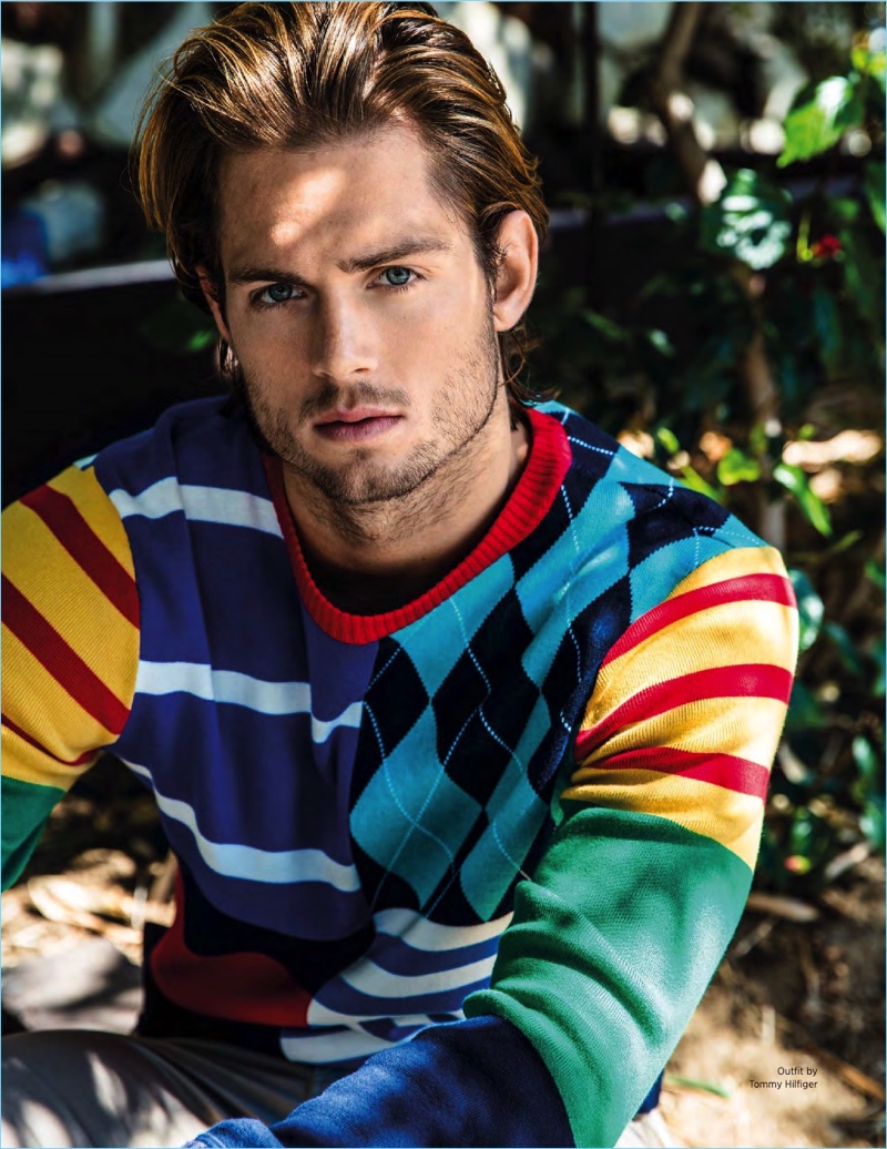 Chad James Buchanan wears a colorful Tommy Hilfiger sweater for Da Man.