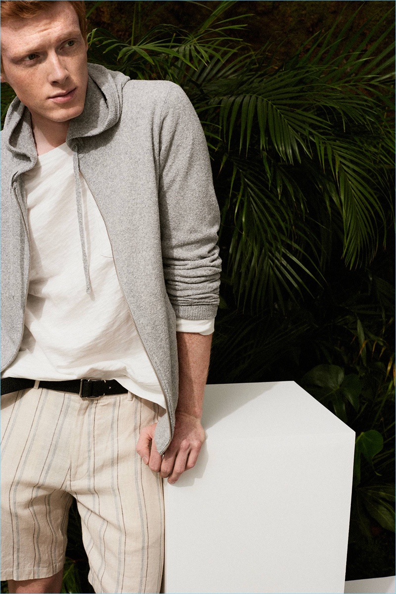 Wearing new Club Monaco arrivals, Linus Wordemann sports a terry full-zip hoodie $149.50, pocket tee $32.50, and stripe linen shorts $89.50.