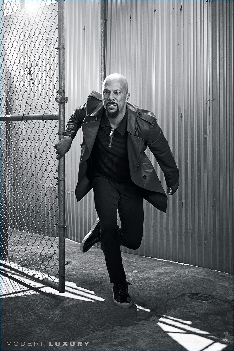 On the move, Common wears a Burberry leather trench coat with a Michael Kors polo. Common also rocks Theory pants and Noah Waxman sneakers.
