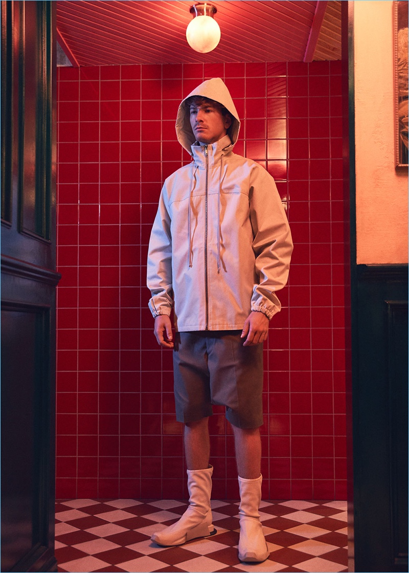 Making a statement in Rick Owens, Robert Alfons wears tailored podshorts $718 with Rick Owens x Adidas stretch leather socks $805. Robert also models a DRKSHDW by Rick Owens windbreaker bomber jacket $1,327.