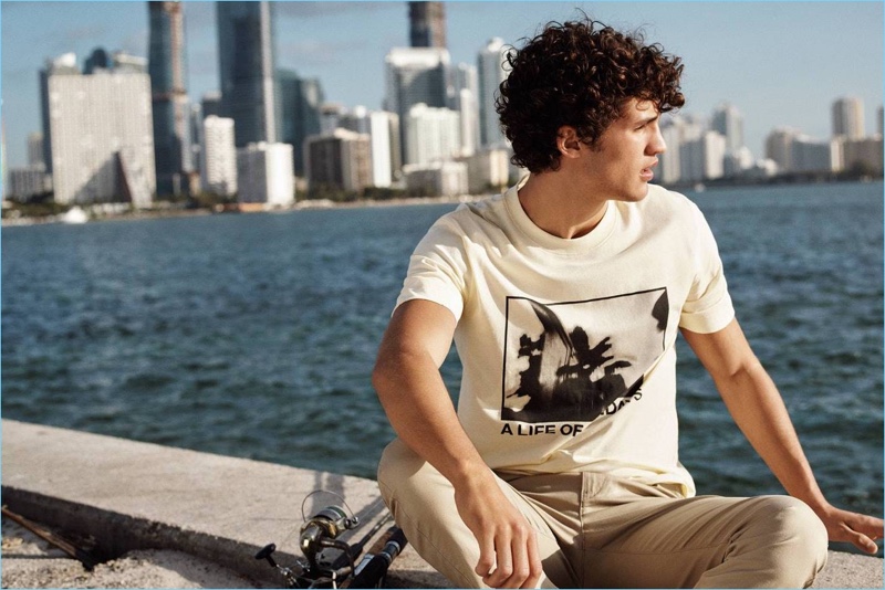 Get graphic in a H&M t-shirt with printed design $12.99 and skinny-fit chinos $29.99.