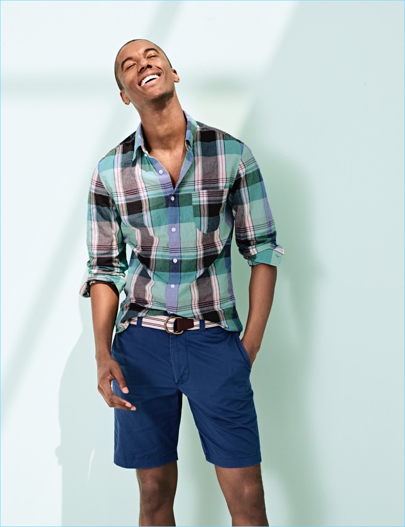 Genuine Indian Madras: All smiles, Claudio Monteiro dons a J.Crew Indian madras shirt $54.50 9″ stretch shorts $65, and a striped web belt $24.99.