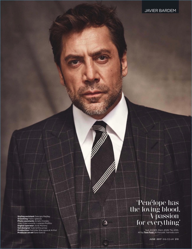 A striking image, Javier Bardem wears a shirt, tie and suit by Tom Ford.