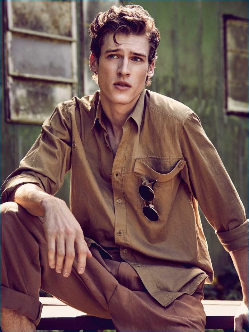 Joel Meacock sports a Dries Van Noten shirt with Ermenegildo Zegna trousers, and Fendi sunglasses for Harrods magazine.