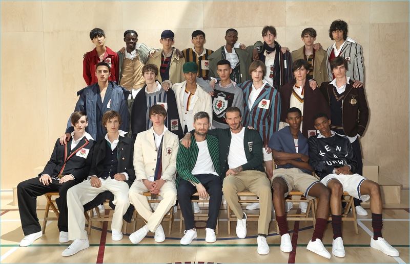 David Beckham and Kent & Curwen creative director Daniel Kearns pose for pictures with the brand's models for spring-summer 2018.
