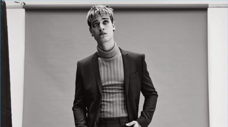 Jonathan Bellini dons a suit by The Kooples with a Gucci turtleneck sweater and Balenciaga boots.